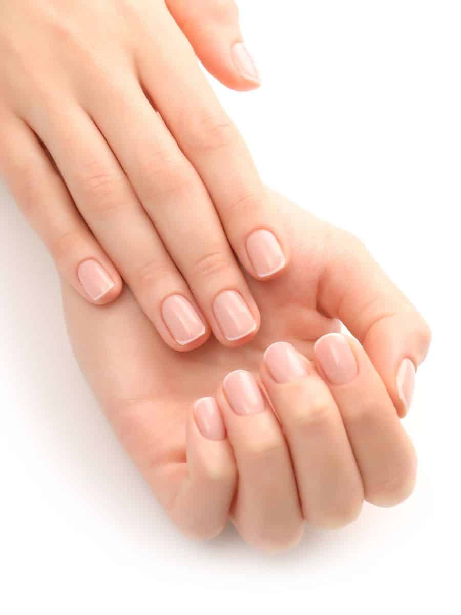 Healthy natural nails with a clean nude manicure
